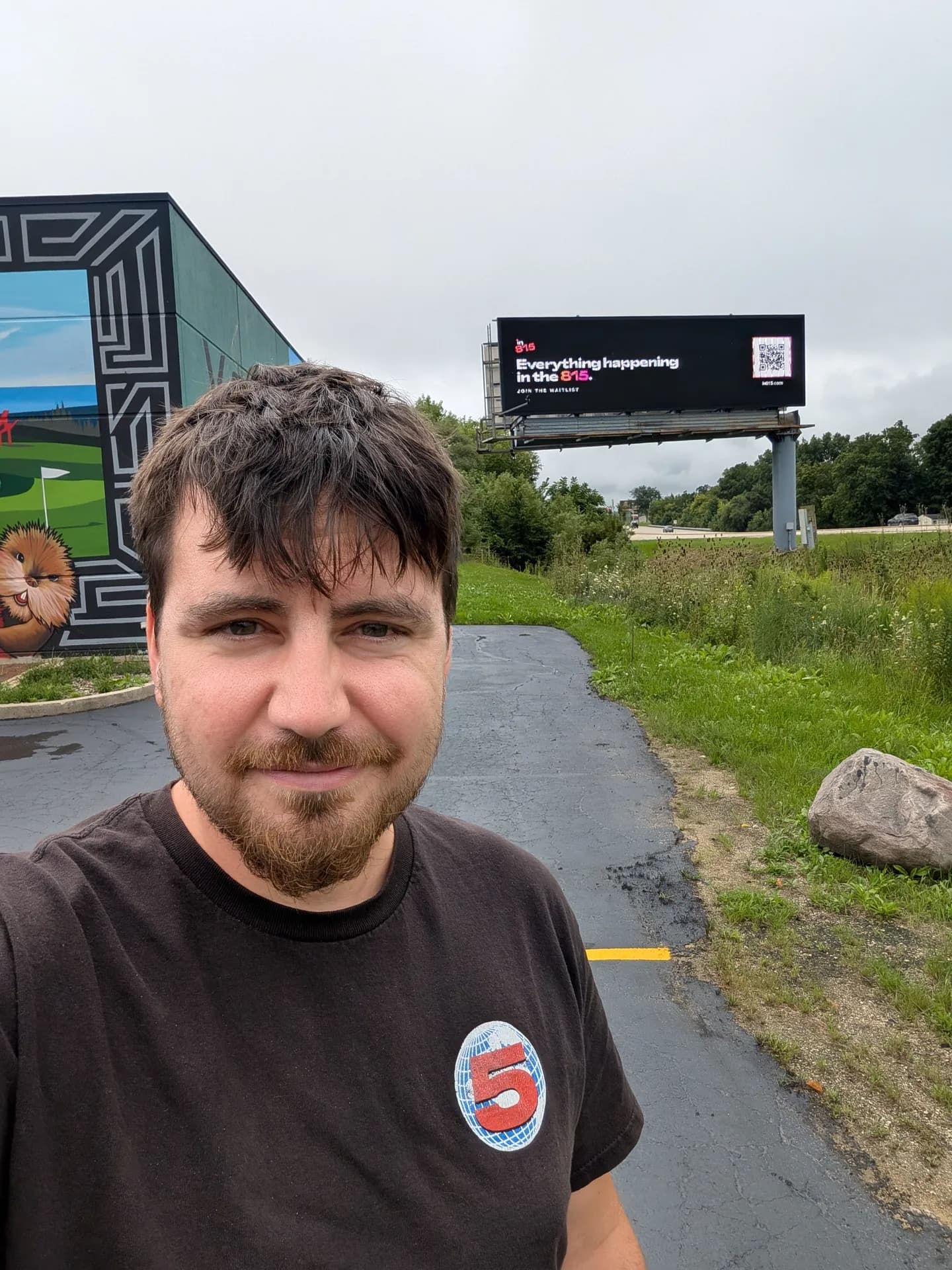 Standing under the in815 billboard in Rockford