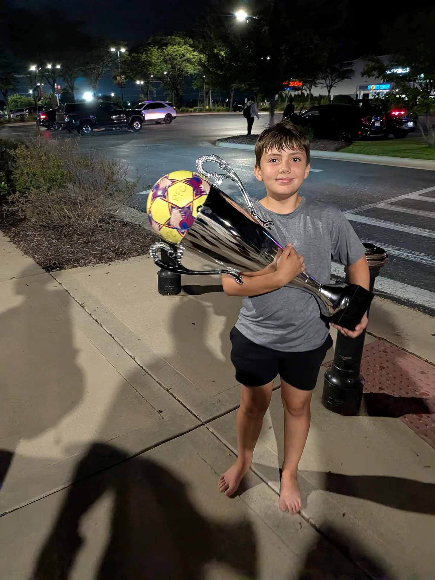 Carrying home the cup, 2026